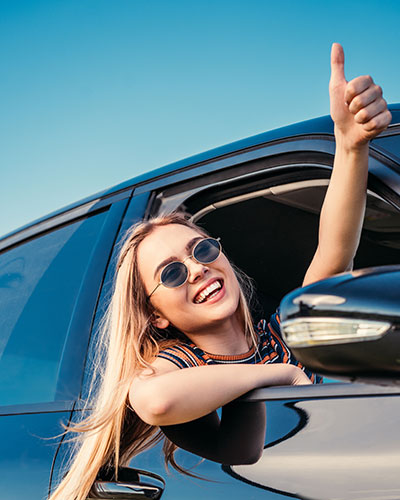 Happy auto insurance client from our Farmers Insurance Agency in Burbank